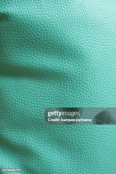 full frame cover green leather texture surface - modern red leather sofa stock pictures, royalty-free photos & images