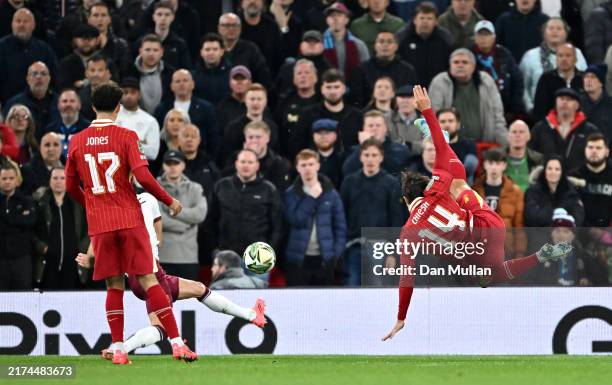 Federico Chiesa of Liverpool passes the ball prior to Diogo Jota of Liverpool scores his team's first goal during the Carabao Cup Third Round match...