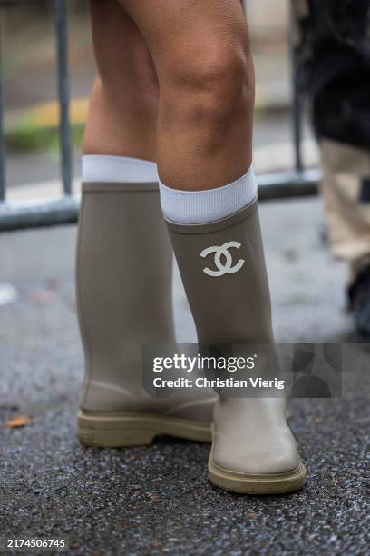 Guest wears Chanel gumbootoutside Cecilie Bahnsen during Womenswear Spring/Summer 2025 as part of Paris Fashion Week on September 25, 2024 in Paris,...