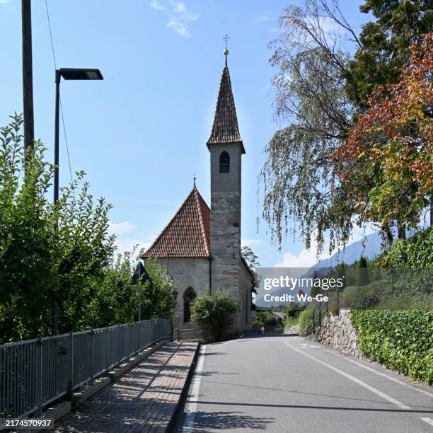 the chapel of st. rupert dorf tirol, south tyrol. - chapel stock pictures, royalty-free photos & images