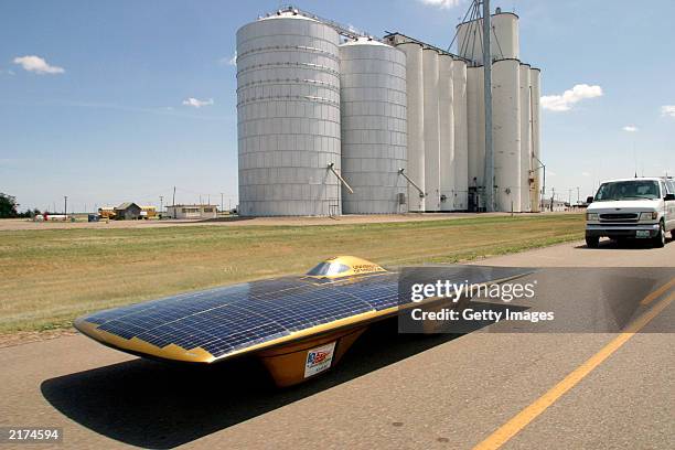 The University of Missouri-Columbia solar car heads down Route 66 on its way to Tucumcari, New Mexico during the American Solar Challenge July 17,...