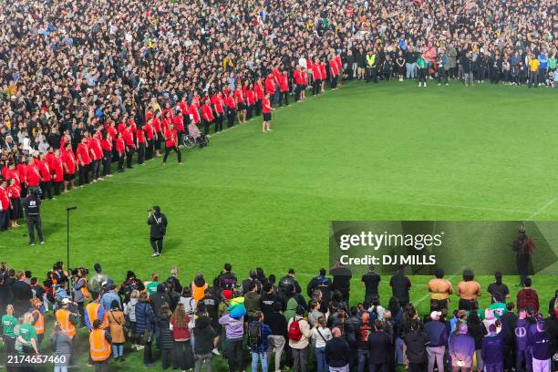 Participants gather in a world record attempt for the largest mass Haka at Eden Park in Auckland on September 29, 2024. The gathering on September 29...