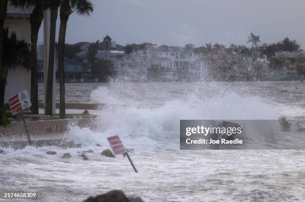 Waves from the Gulf of Mexico crash on shore as Hurricane Helene churns offshore on September 26, 2024 in St. Pete Beach, Florida. Later today,...