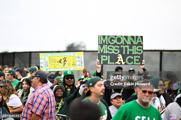 Fans wait to enter the stadium before the Oakland Athletics play the Texas Rangers at the Oakland Coliseum on September 26, 2024 in Oakland,...