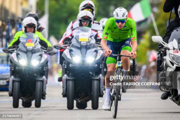 Slovenia's Tadej Pogacar competes in the men's Elite Road Race cycling event during the UCI 2024 Road World Championships, in Zurich, on September...
