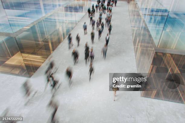 woman walking in the crowds of people - rörelse bildbanksfoton och bilder