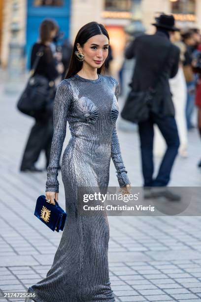 Heart Evangelista wears silver sequined dress outside Schiaparelli during Womenswear Spring/Summer 2025 as part of Paris Fashion Week on September...