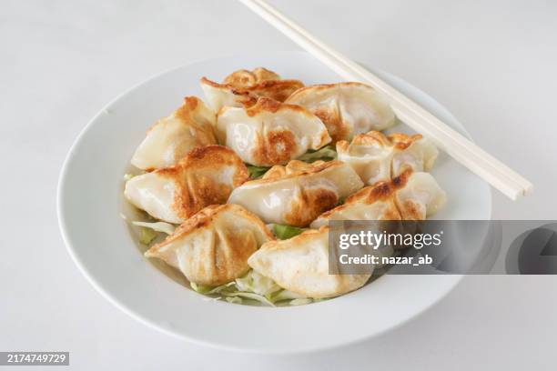 fried dumpling. - dim sum stock pictures, royalty-free photos & images