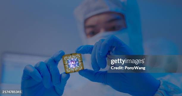 male engineer with ai chip - conductor stock pictures, royalty-free photos & images