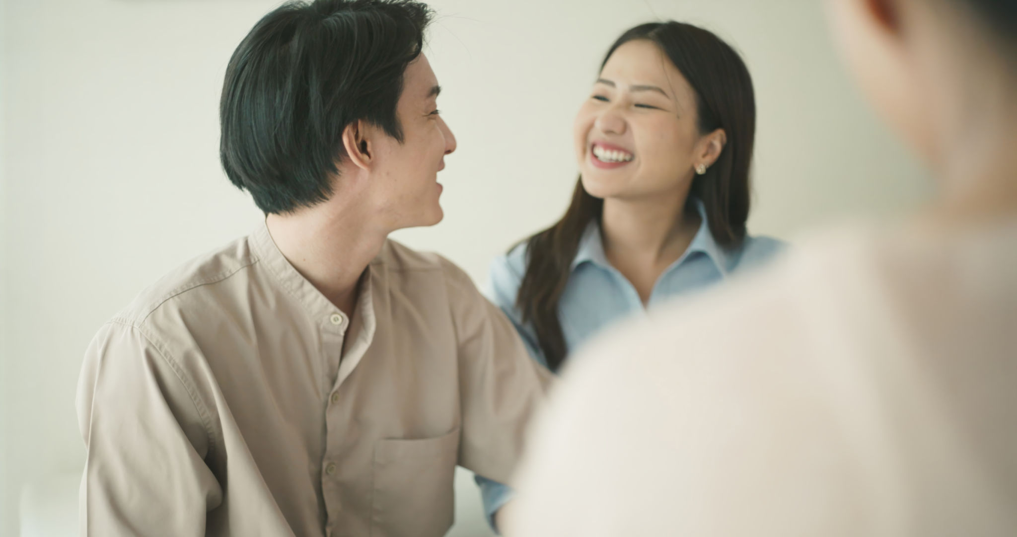 Happy Couple Engaging in Warm Conversation Together at Home. Happy Couple Engaging in Warm Conversation Together at Home.