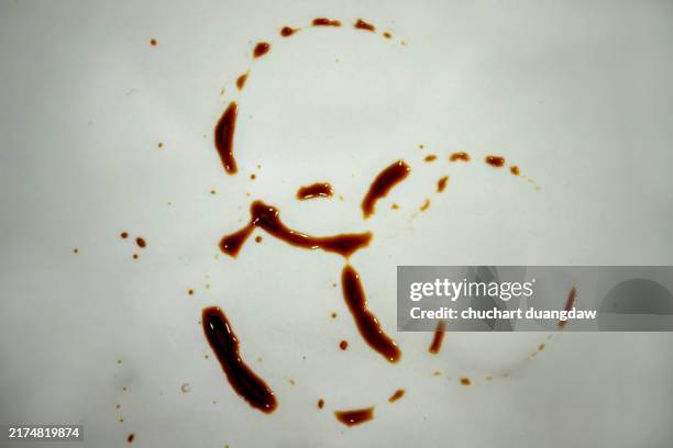 coffee stain on a white background - cafe au lait spots stock pictures, royalty-free photos & images