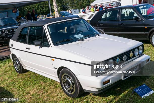 Volkswagen Golf Cabriolet MKI convertible car on display during the 2024 Wheels at Mariënwaerdt car show on September 14 in Beesd, The Netherlands.