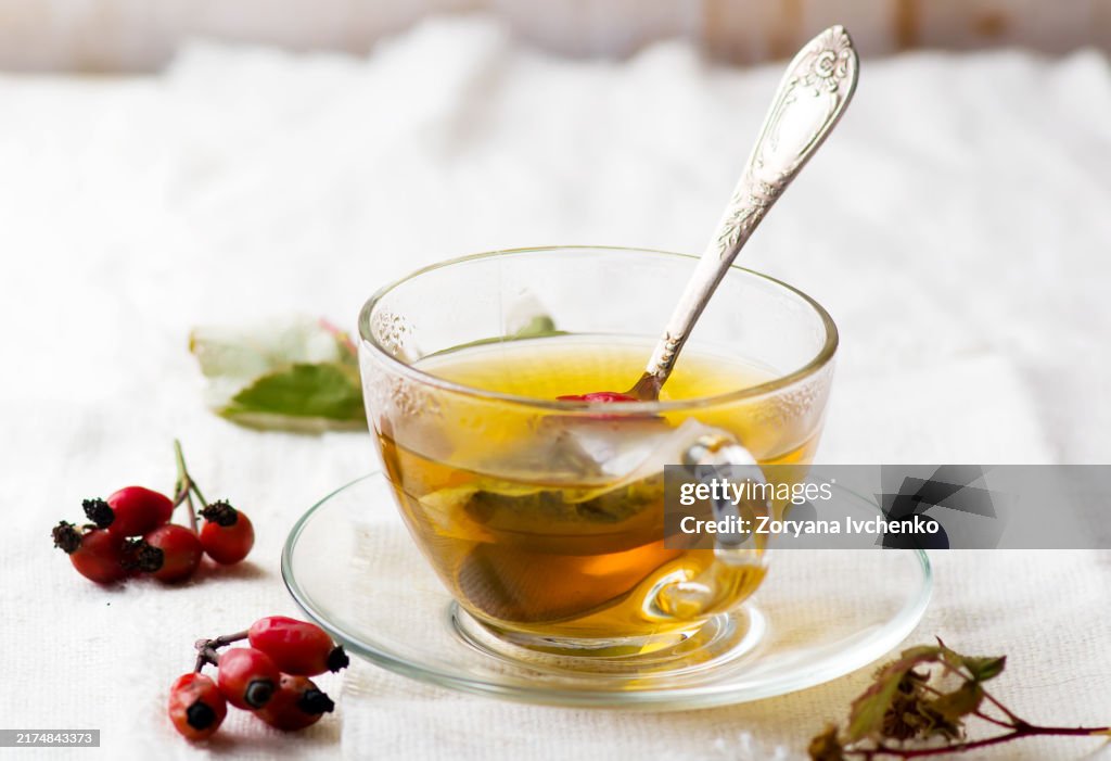 Herbal tea with organic herbs in a glass cup