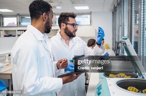 Diverse Lab Technicians Analyzing Samples Diverse Lab Technicians Analyzing Samples