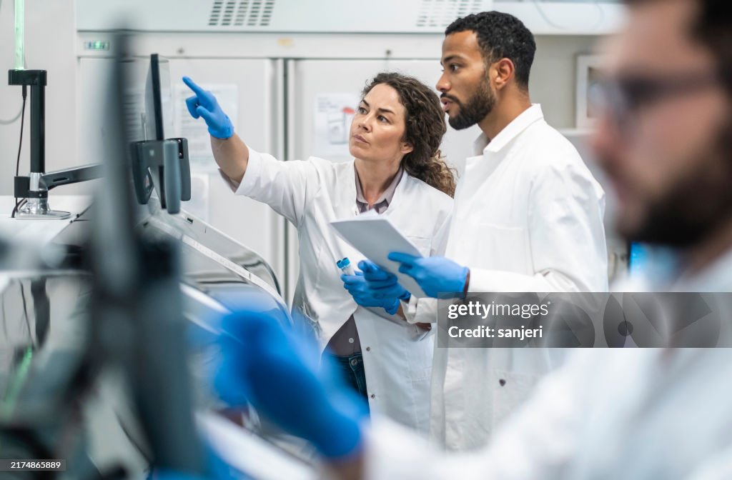 Diverse Lab Colleagues in Thoughtful Analysis