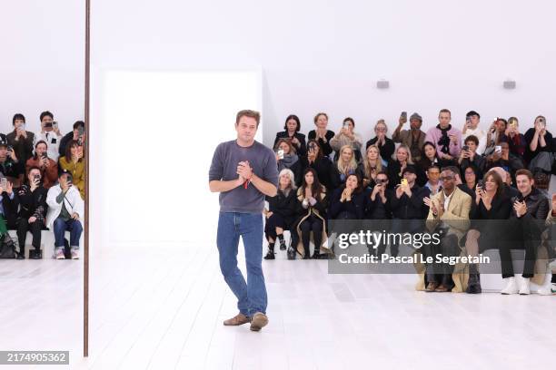 Designer Jonathan Anderson walks the runway during the Loewe Paris Womenswear Spring-Summer 2025 show as part of Paris Fashion Week on September 27,...