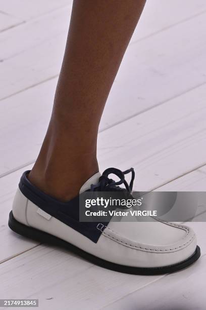Model walks the runway during the Loewe Ready to Wear Spring/Summer 2025 fashion show as part of the Paris Fashion Week on September 27, 2024 in...