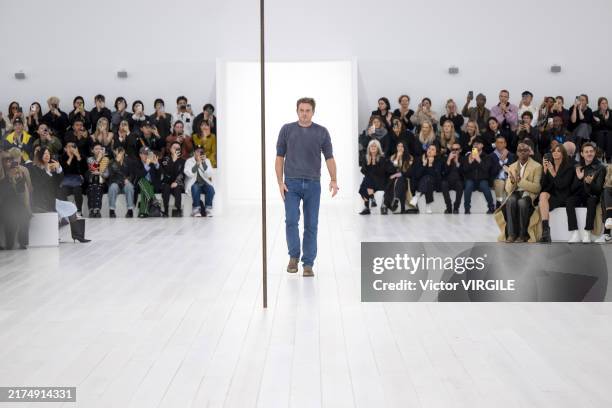 Fashion designer Jonathan Anderson walks the runway during the Loewe Ready to Wear Spring/Summer 2025 fashion show as part of the Paris Fashion Week...