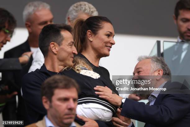 Former model Alina Seredova and husband Alessandro Nasi salute Gianluca Ferrero President of Juventus in the tribune prior to the Serie A match...