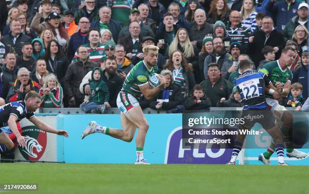 Leicester Tigers's Oliver Hassell-Collins crosses the try line but fumbles the ball failing to ground it and Referee Craig Maxwell-Keys rules no try...