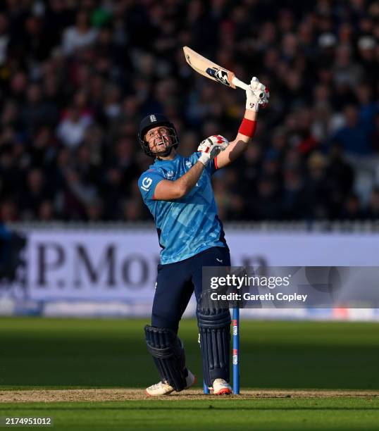 Liam Livingstone of England hits out for six runs during the 4th Metro Bank ODI between England Australia at Lord's Cricket Ground on September 27,...