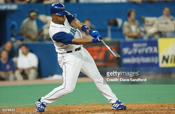 Center fielder Vernon Wells of the Toronto Blue Jays swings at a pitch during the American League game against the New York Yankees at SkyDome on...
