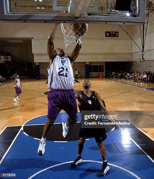 Jamahl Mosley of the Milwaukee Bucks dunks during the 2003 Pepsi Pro Summer League game against the Detroit Pistons at RDV Sportsplex on July 11,...