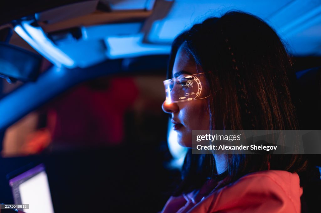 Female neon portrait of two women who using smart glasses for artificial intelligence, chatbot and augmented reality.
