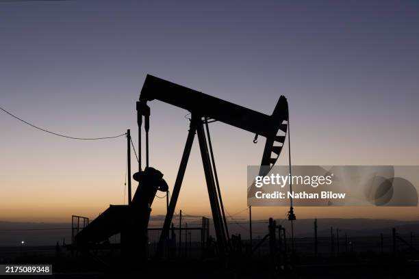 gas pump & prices in california - bakersfield stock pictures, royalty-free photos & images