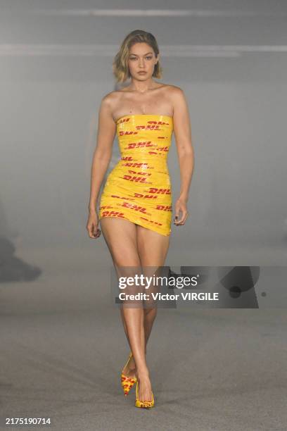 Gigi Hadid walks the runway during the Vetements Ready to Wear Spring/Summer 2025 fashion show as part of the Paris Fashion Week on September 27,...