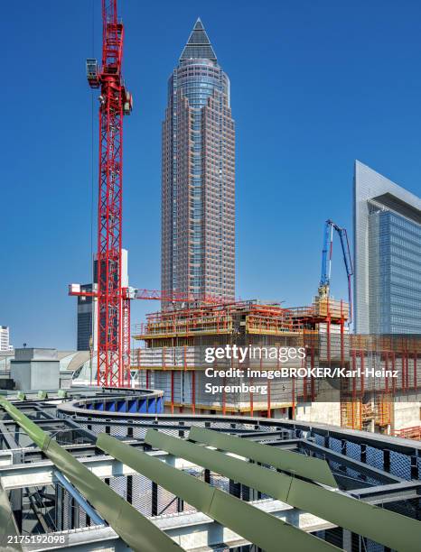 major construction site at the frankfurt messeturm, frankfurt, hesse, germany, europe - messeturm stock-fotos und bilder