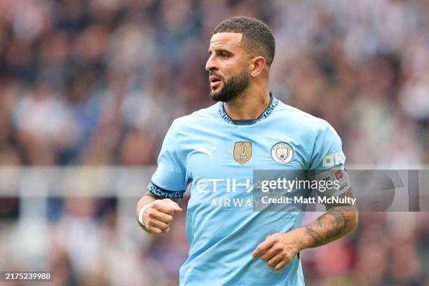 Kyle Walker of Manchester City looks on while wearing the captains armband during the Premier League match between Newcastle United FC and Manchester...