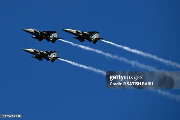 The Indian Air Force SEPECAT Jaguar fighter jets fly past during a rehearsal for the upcoming IAF Day celebrations, at the Marina beach in Chennai on...