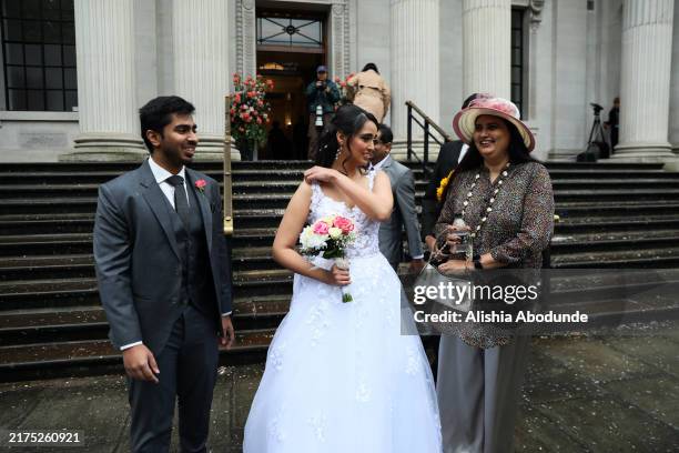 Ishan Godawatta and Ananya Bhallaoutside leave Old Marylebone Town Hall after getting married on October 1, 2024 in London, England. Old Marylebone...