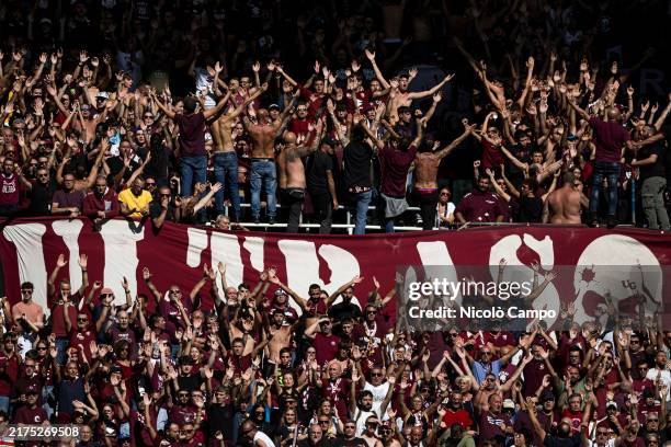 Fans of Torino FC in sector 'Curva Maratona' show their support during the Serie A football match between Torino FC and SS Lazio. SS Lazio won 3-2...