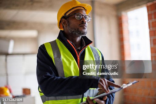 Engineer working at construction site Engineer working at construction site