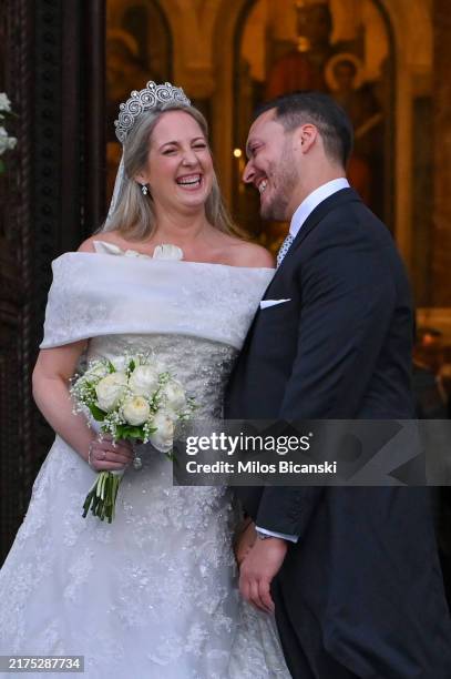 Princess Theodora daughter of former King of Greece Constantine II, and her husband Matthew Kumar leave the Athens' Orthodox Cathedral following...