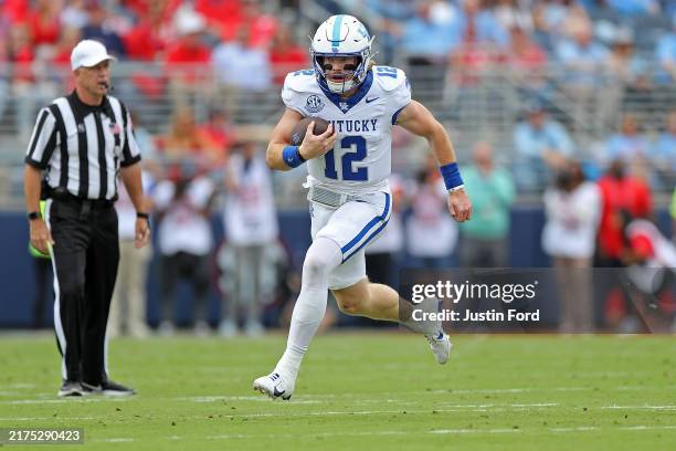 Brock Vandagriff of the Kentucky Wildcats carries the ball during the first half against the Mississippi Rebels at Vaught-Hemingway Stadium on...