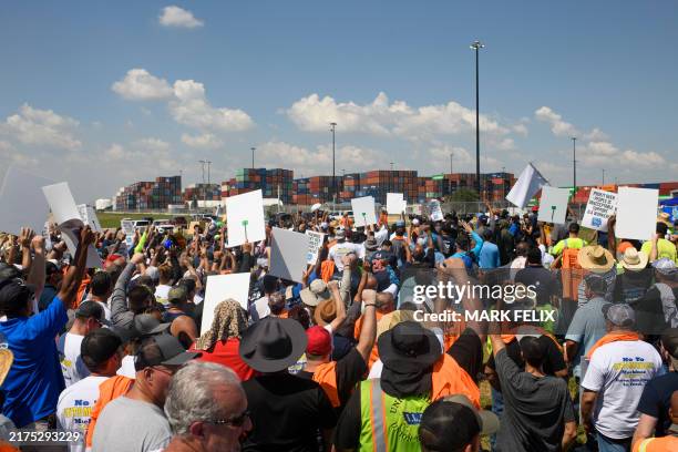 Dockworkers gather at the Bayport Container Terminal in Seabrook, Texas, on October 1, 2024. Officials at 14 ports along the US East and Gulf Coasts...