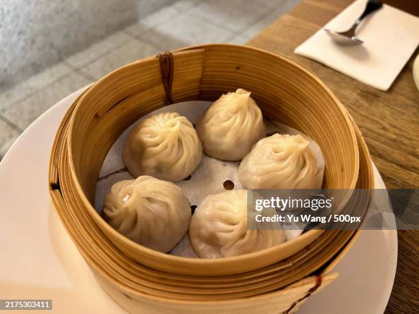 close-up of dumplings in container on table,canberra,australian capital territory,australia - dim sum stock pictures, royalty-free photos & images