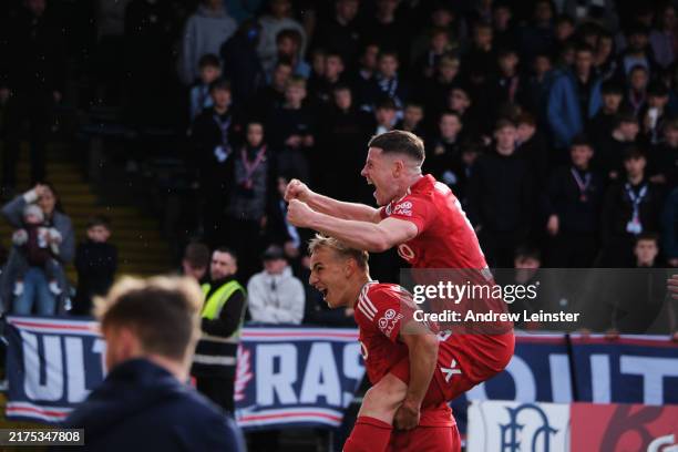 Aberdeen's Topi Keskinen celebrates with Kevin Nisbet after scoring to make it 2-0 during a during the William Hill Premiership match between Dundee...