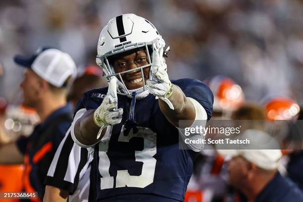 Kaytron Allen of the Penn State Nittany Lions celebrates after ruling for a first down against the Illinois Fighting Illini during the first half at...