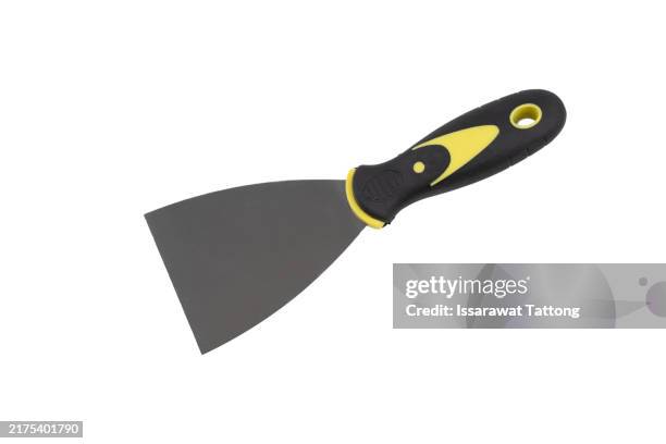 yellow steel trowel scraper or spatula rubber handle isolated on white background - trowel stock pictures, royalty-free photos & images