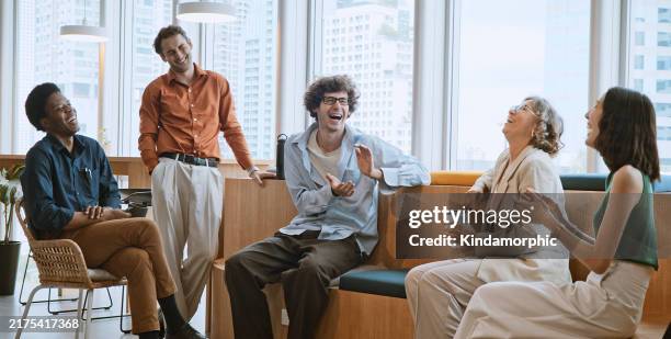 group of multi-ethnic business man, woman talk and laugh together at corporate office, casual meeting. happy people, workplace diversity, work life, team building, businesspeople lifestyle concept - happy colleagues doing team building activity imagens e fotografias de stock