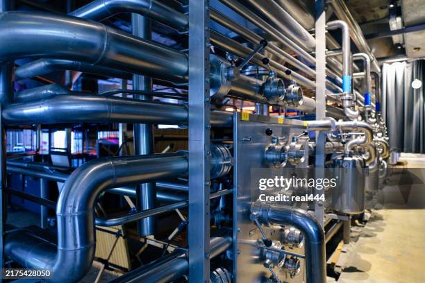old brewery with stainless steel equipment - rostfritt stål bildbanksfoton och bilder