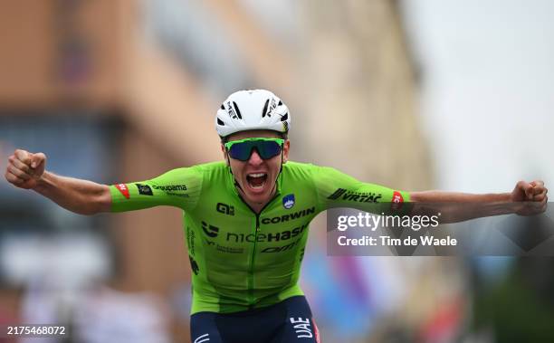 Tadej Pogacar of Team Slovenia celebrates at finish line as gold medal winner during the 97th UCI Cycling World Championships Zurich 2024, Men's...