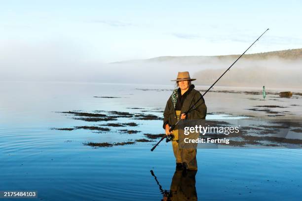 a mature female sea angler in early morning light - maritime provinces stock pictures, royalty-free photos & images