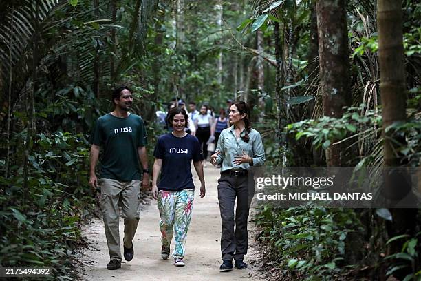 Queen Mary of Denmark walks on a trail with Musa director general Filippo Stampanoni and archaeologist Meliam Gaspar during a visit to the Museum of...