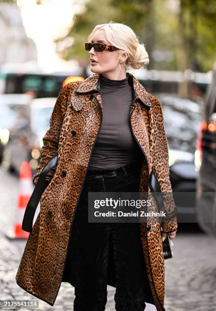 Zofia Krasicki is seen wearing an Isabel Marant jacket, brown top, brown pants, brown shoes outside the Isabel Marant show during Womenswear...