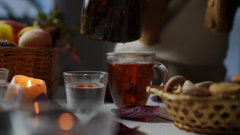 https://media.gettyimages.com/id/2175688120/video/enjoy-a-cozy-tea-time-with-delightfully-refreshing-tea-varieties-and-tasty-snacks.jpg?b=1&s=640x640&k=20&c=kuYk0mmZf8qbbFhftl06YPCTGdiggxLehQGbopacKYQ=